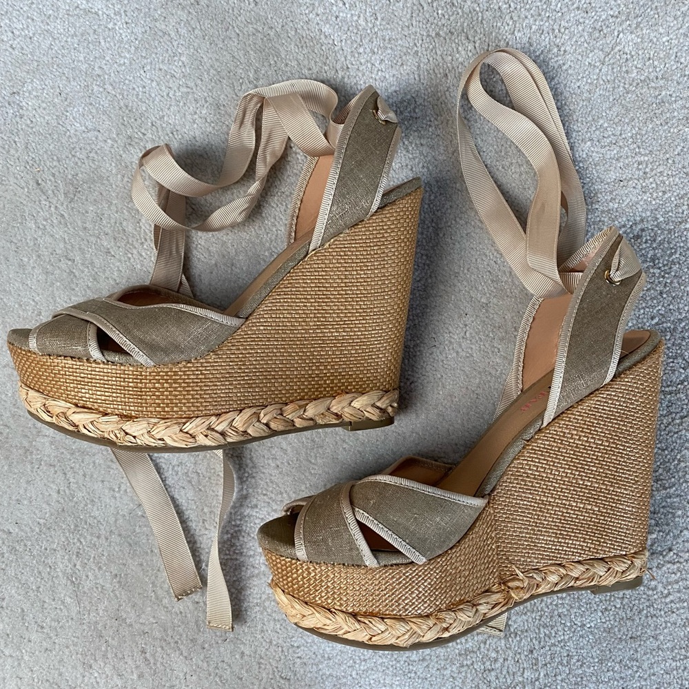 Lovely, platform espadrille wedges. Wrap ankle strap. Back height 5” front 1.75”